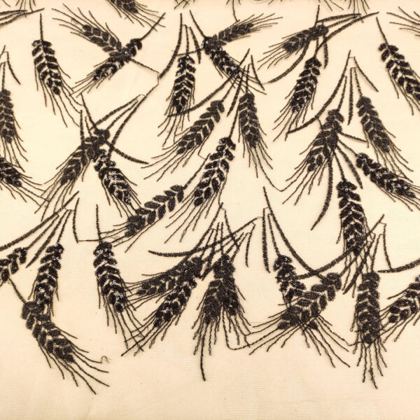 Tessuto Tulle mano seta ricamato con micro paillettes motivo floreale nero