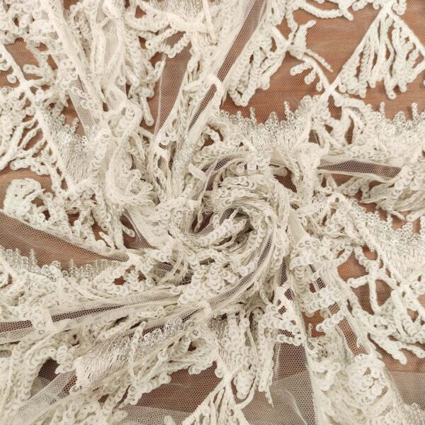 Tessuto Tulle elasticizzato ricamato con paillettes a frange ghiaccio