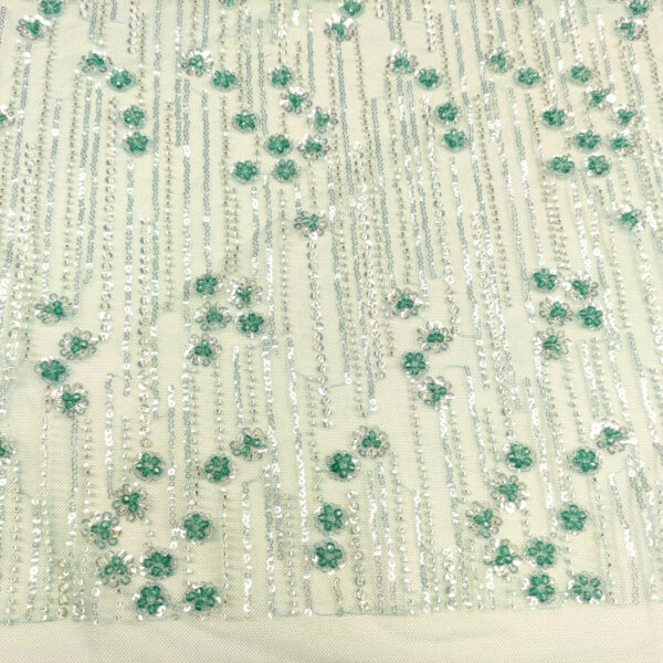 Tessuto Tulle mano seta ricamato con perline e paillettes motivo floreale argento - smeraldo