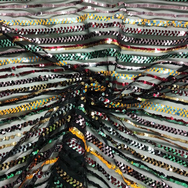 Tessuto Tulle Elasticizzato Ricamato con paillettes motivo rigato giallo - nero - rosso