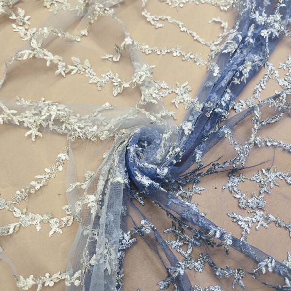 Tessuto Tulle ricamato con perle motivo sfumato carta da zucchero