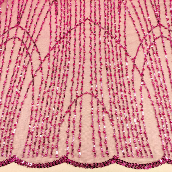 Tessuto Tulle mano seta ricamato con perle e pietre motivo astratto fucsia