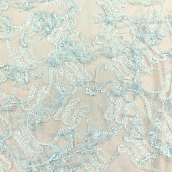 Tessuto Tulle mano seta ricamato motivo astratto 3d celeste