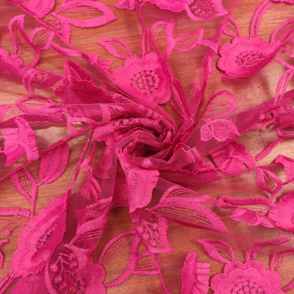 Tessuto Tulle ricamato motivo floreale fucsia