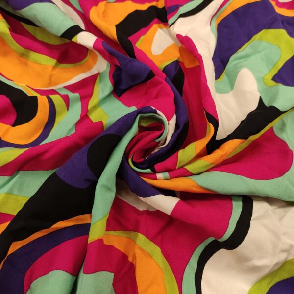 Tessuto Viscosa a fantasia motivo astratto fucsia - viola - tiffany