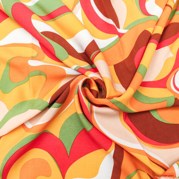 Tessuto Viscosa a fantasia motivo astratto arancio - verde - rosso