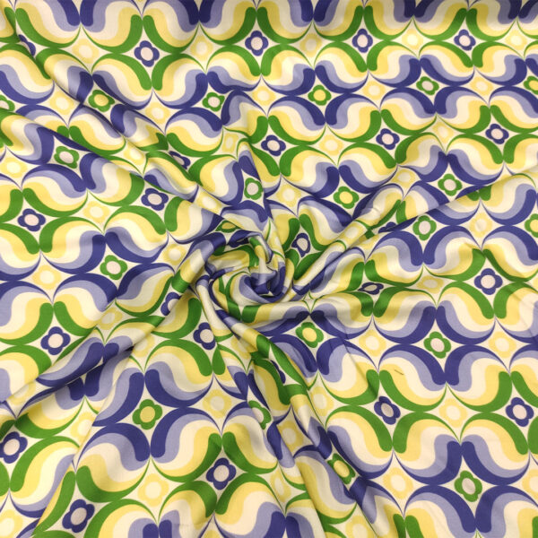 Tessuto Viscosa a fantasia motivo astratto bianco - viola - lilla - verde - giallo