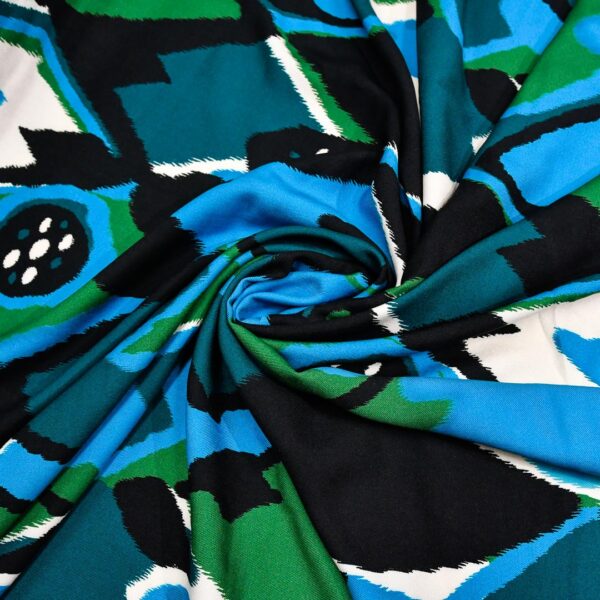 Tessuto Viscosa a fantasia motivo astratto nero - turchese - verde