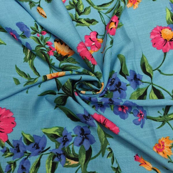 Tessuto Viscosa a fantasia motivo floreale turchese - fucsia - verde