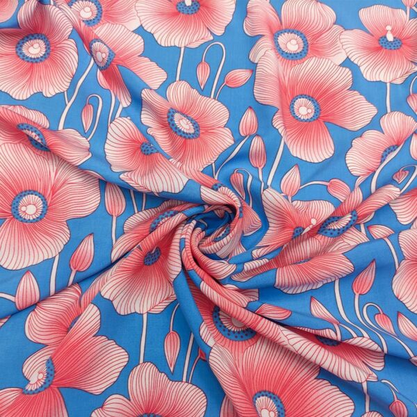 Tessuto Viscosa a fantasia motivo floreale turchese - rosa - bianco