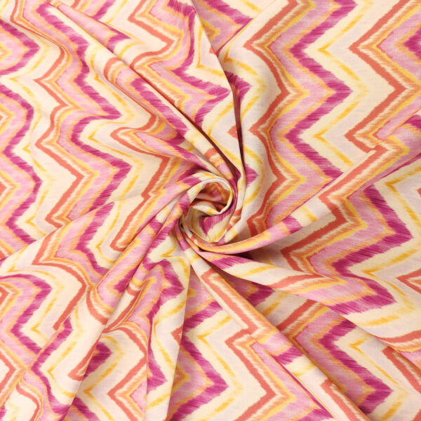 Tessuto Viscosa a fantasia motivo geometrico fucsia - giallo - corallo