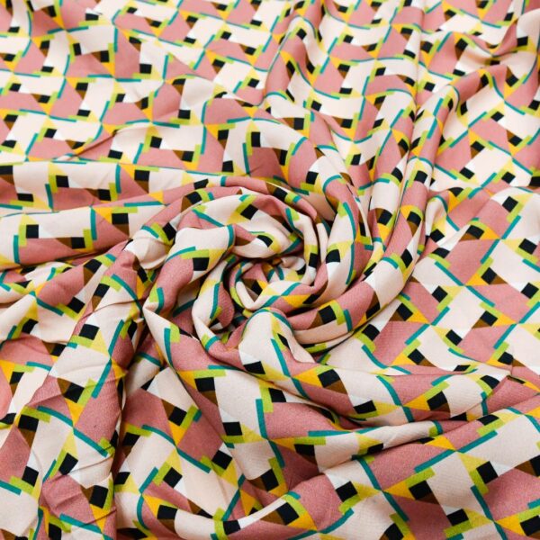 Tessuto Viscosa a fantasia motivo geometrico rosa - nero