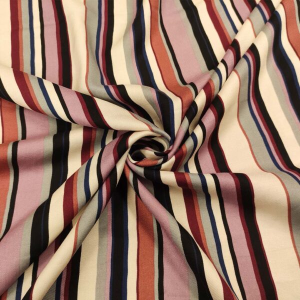 Tessuto Viscosa a fantasia motivo rigato avorio - nero - glicine - ruggine