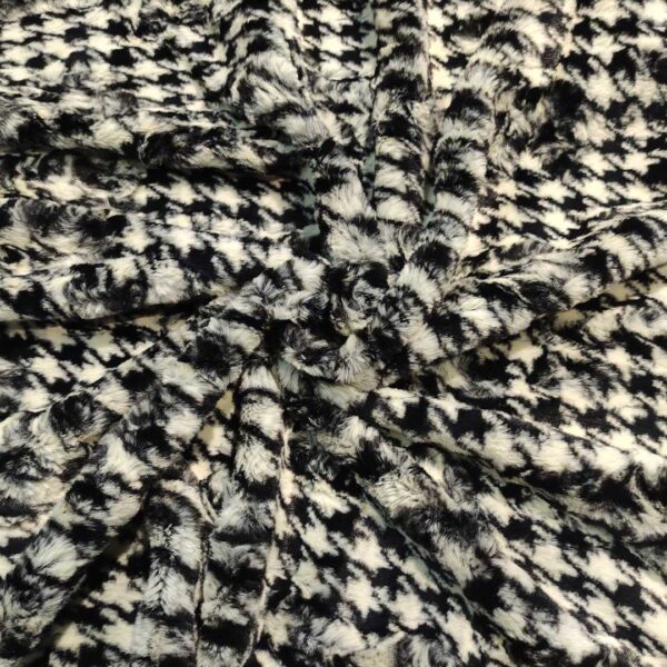 Tessuto Eco Pelliccia motivo pied de poule bianco - nero