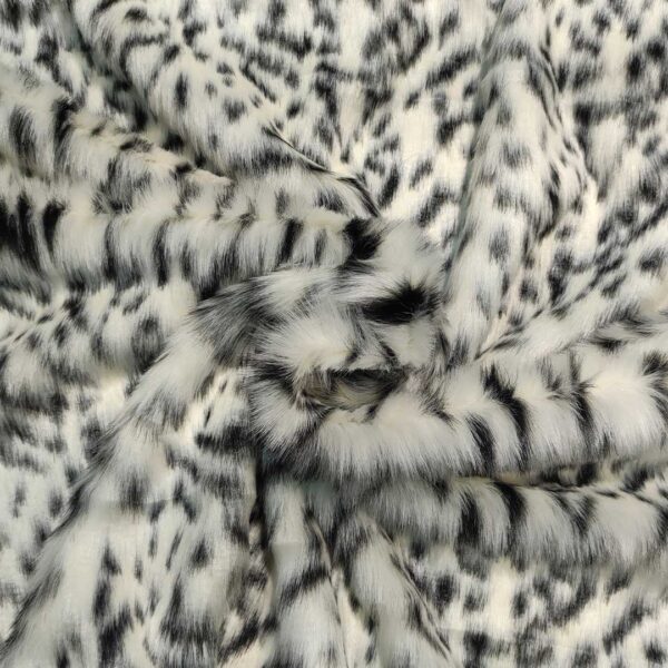 Tessuto Eco Pelliccia motivo animalier bianco - nero