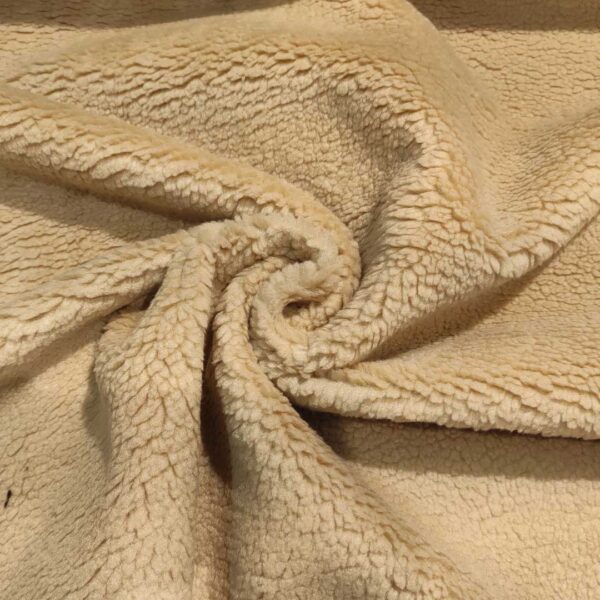 Tessuto Eco Pelliccia Teddy beige doppiato con tessuto panno blu