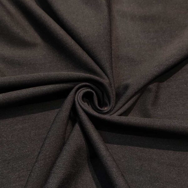 Tessuto Jeans leggero elasticizzato tinta unita testa di moro