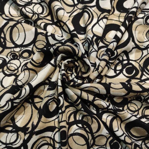 Tessuto Jersey di cotone a fantasia motivo geometrico panna - nero - beige