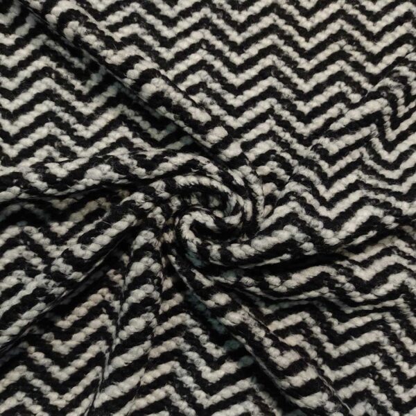Tessuto Lana Cotta tweed motivo spigato bianco - nero