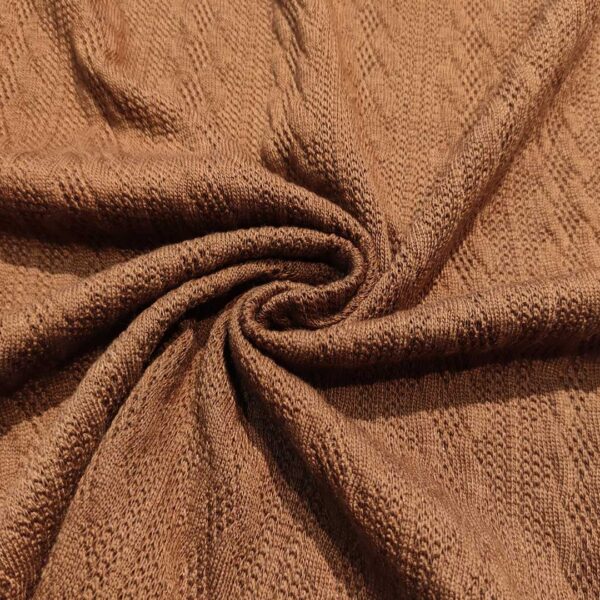 Tessuto Maglia Mano lana in tinta unita motivo treccia cuoio