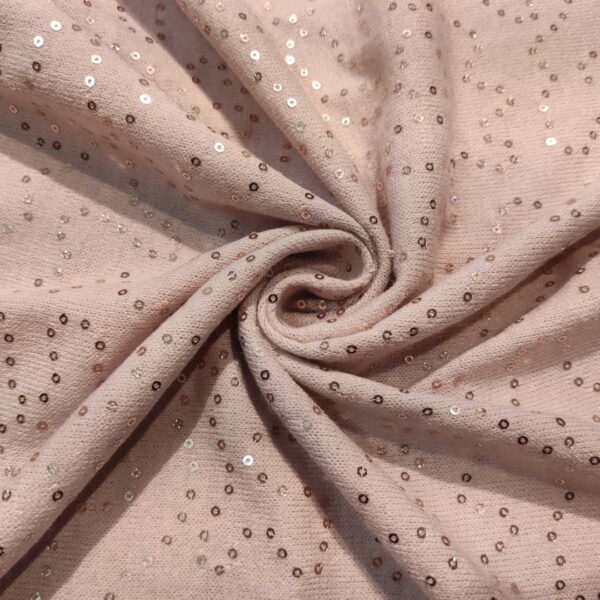 Tessuto Maglia Mano lana in tinta unita ricamato con paillettes rosa
