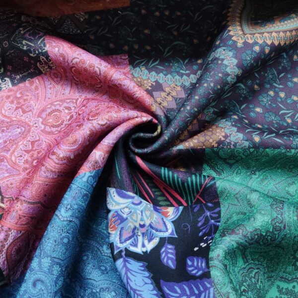 Tessuto per cappotto motivo astratto fucsia - verde - arancione - blu