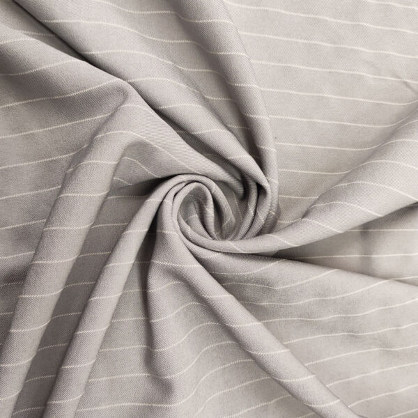 Tessuto Cady Elasticizzato effetto melange motivo gessato grigio - bainco