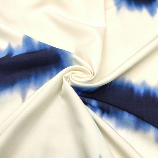 Tessuto Cady elasticizzato a fantasia motivo astratto blu navy - bianco