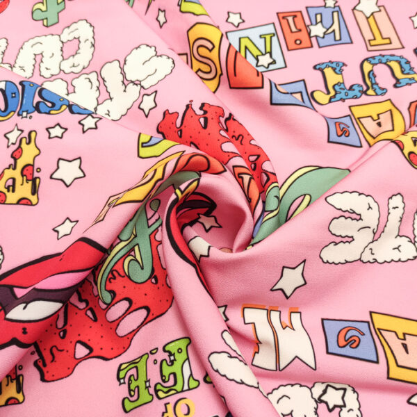 Tessuto Cady elasticizzato a fantasia motivo astratto rosa - giallo - rosso