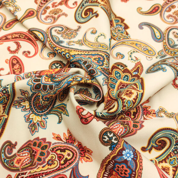 Tessuto Cady elasticizzato a fantasia motivo floreale cashmere beige - arancione - blu