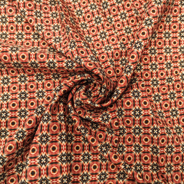 Tessuto Cady elasticizzato a fantasia motivo geometrico ruggine - nero