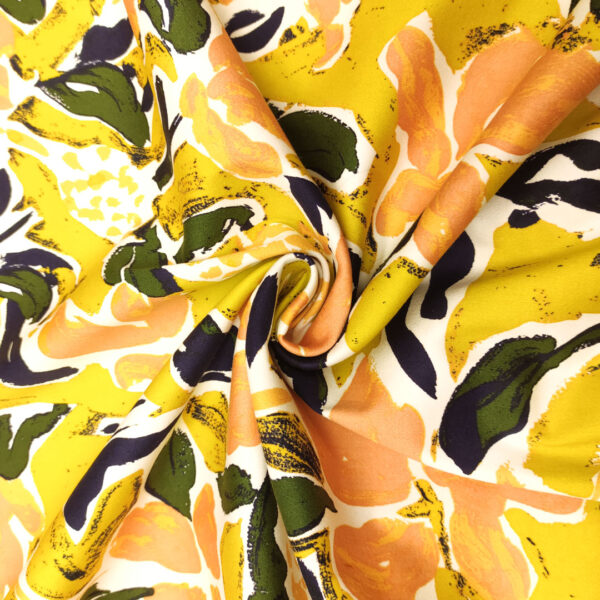 Tessuto Cotone a fantasia motivo astratto cedro - verde - blu