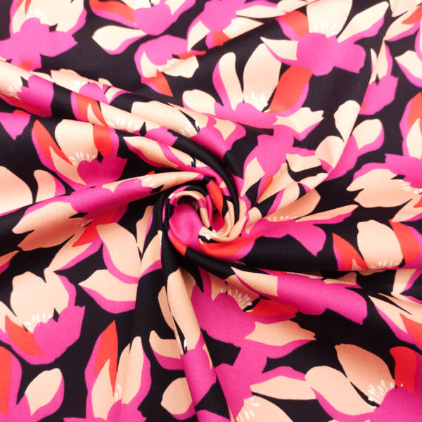 Tessuto Cotone a fantasia motivo floreale nero - fucsia