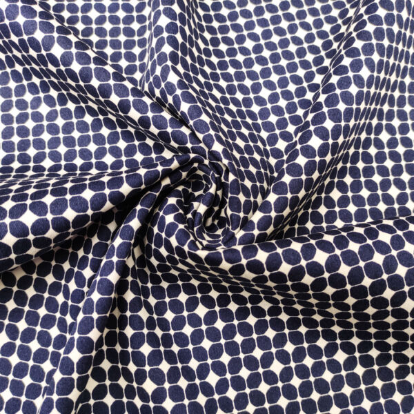 Tessuto Cotone a fantasia motivo geometrico bianco - blu notte