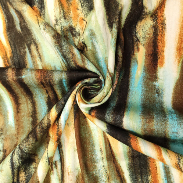 Tessuto Cotone a fantasia motivo astratto verde militare - ruggine - turchese