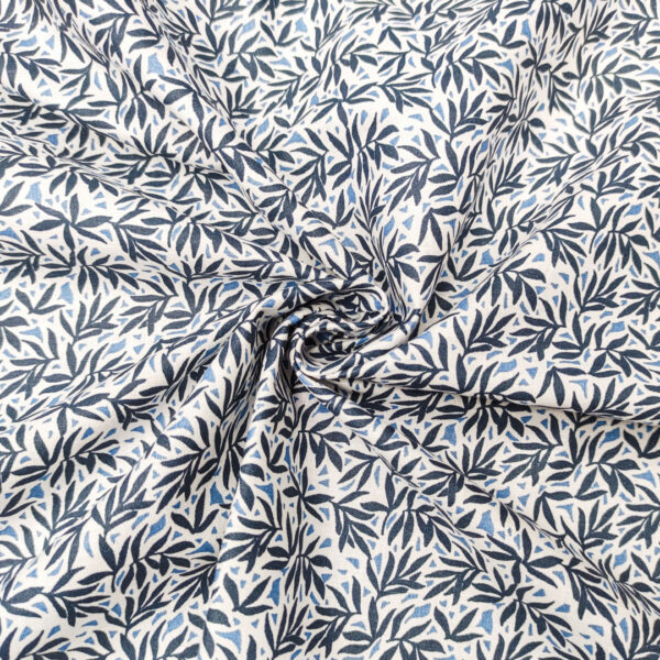 Tessuto Cotone leggero a fantasia motivo astratto blu - bianco - nero