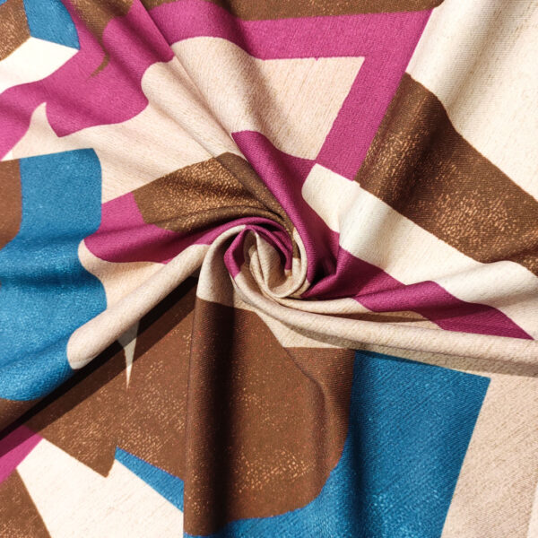 Tessuto Crepe elasticizzato a fantasia motivo astratto blu ottanio - azalea - cioccolato