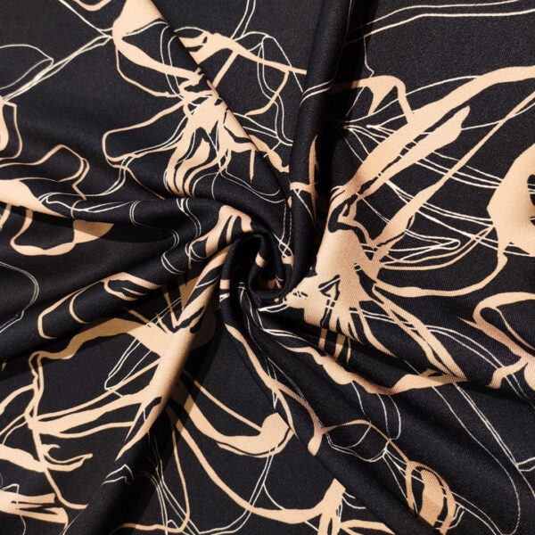 Tessuto Crepe elasticizzato a fantasia motivo floreale nero - beige