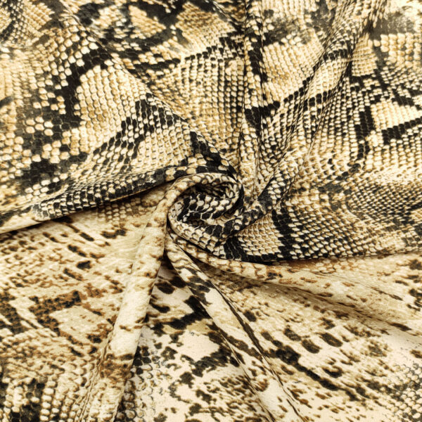 Tessuto Doppio Georgette a fantasia motivo animalier beige - marrone