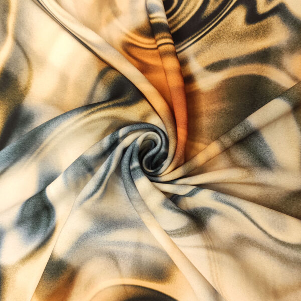 Tessuto Doppio Georgette a fantasia motivo astratto beige - blu - nero