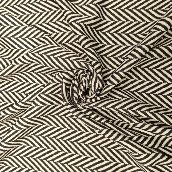 Tessuto Doppio Georgette a fantasia motivo geometrico bianco - nero