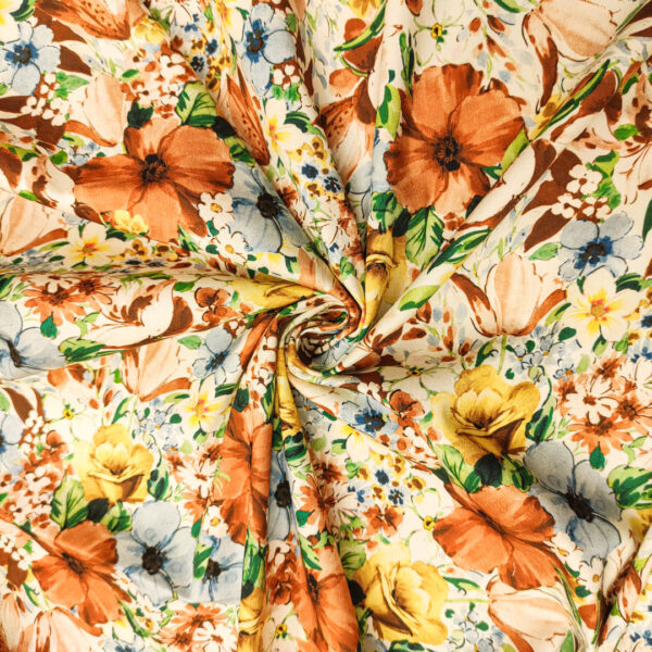 Tessuto Gabardine di Cotone a fantasia motivo floreale ruggine - giallo - celeste