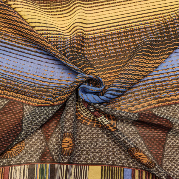 Tessuto Georgette a fantasia motivo astratto blu - senape - marrone