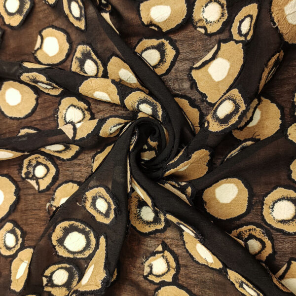 Tessuto Georgette a fantasia motivo astratto nero - marroncino