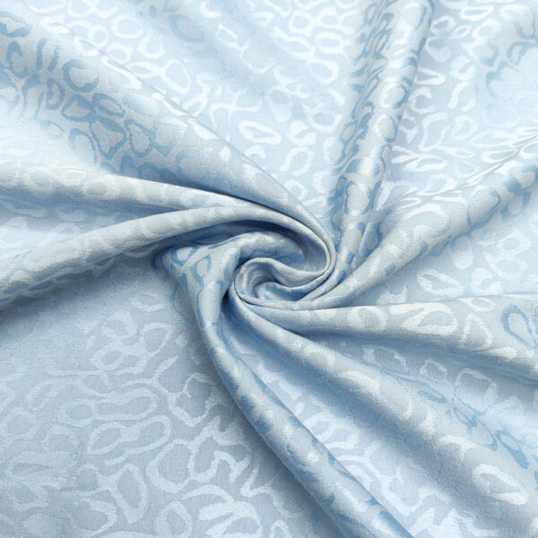 Tessuto Jacquard in cotone motivo celeste