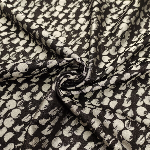 Tessuto Jacquard in cotone motivo astratto nero - argento
