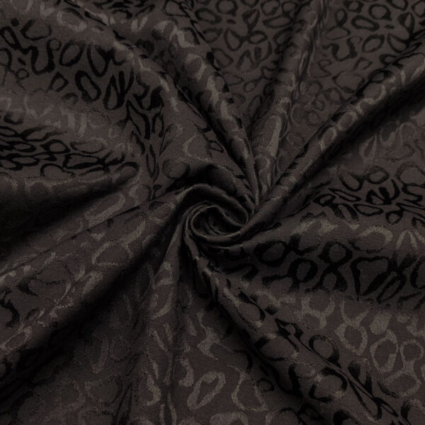 Tessuto Jacquard in cotone motivo astratto nero