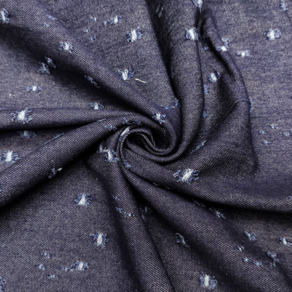 Tessuto Jeans elasticizzato motivo strappato tinta unita denim scuro