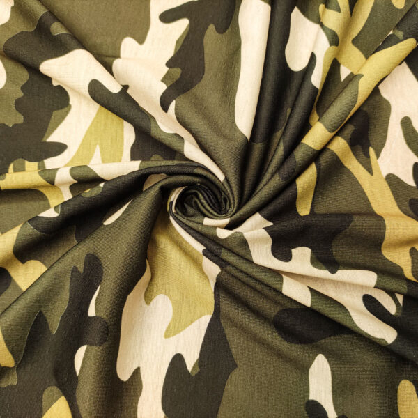 Tessuto Jersey di cotone a fantasia motivo animalier verde chiaro - verde scuro - mela