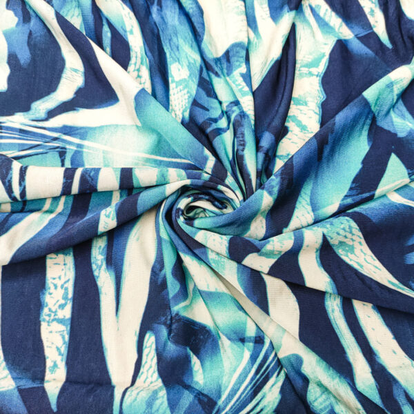 Tessuto Jersey di viscosa a fantasia motivo astratto bianco - blu - turchese